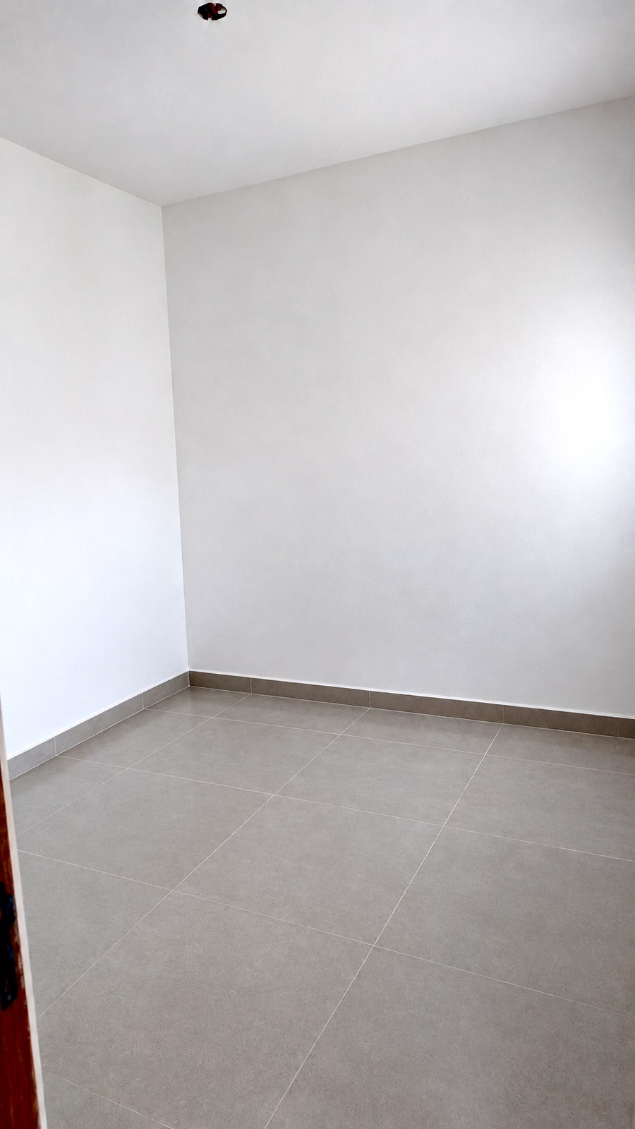 Quarto, visto da porta